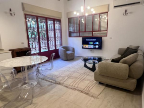 High End Renovated Duplex near Carmel Market by FeelHome